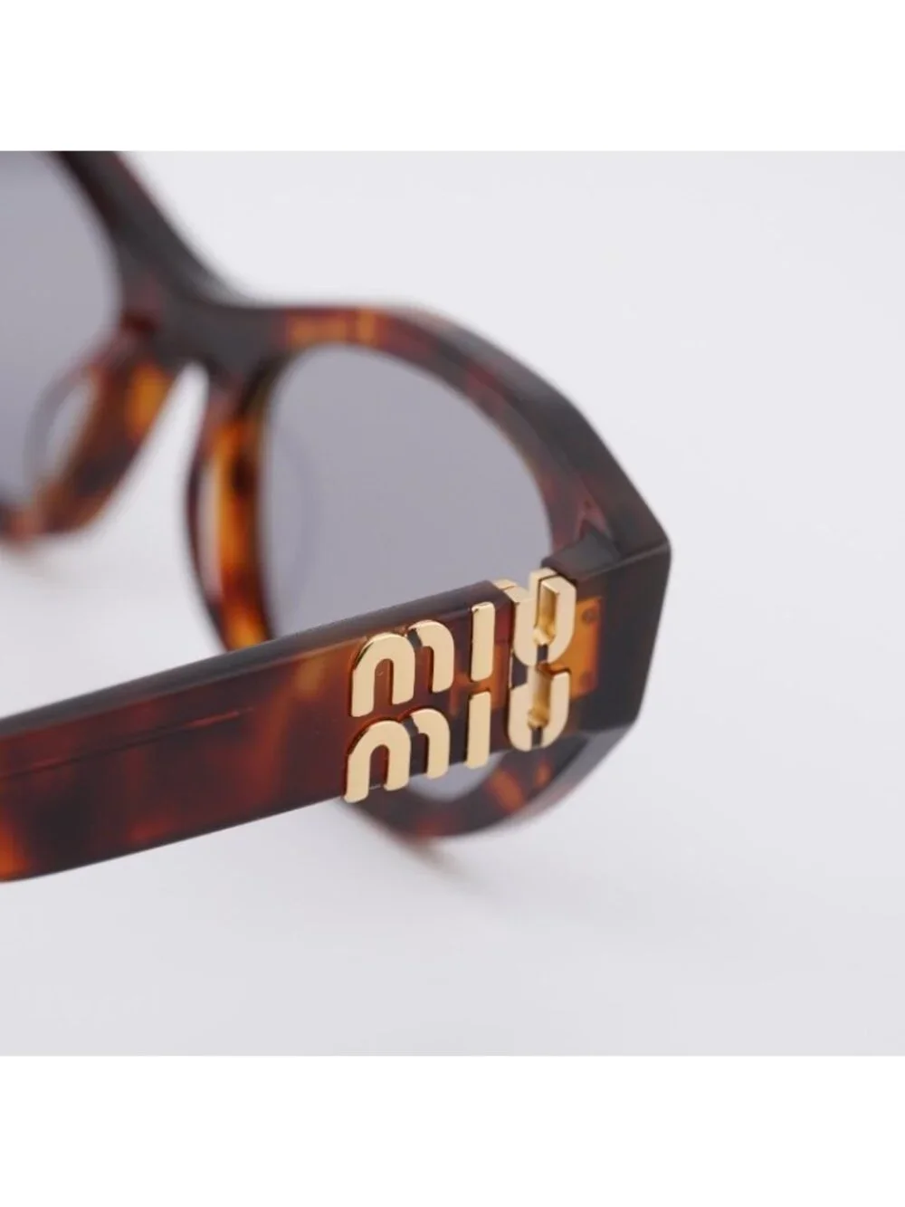 Miu Miu MUA03S 21C40O Sunglasses Havana Mahogany Oval Frame, Grey Lenses